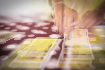 Tarot cards reading divination - Psychic readings and clairvoyance fortune teller hands concept ,...