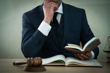 Consultant lawyer concept, Young lawyer business man working  on his desk in office workplace, 