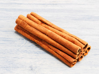 Cinnamon (Cinnamomum verum) spice on white background