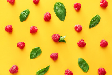 Many ripe raspberry on color background