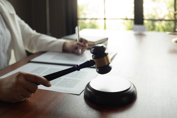 business woman or lawyer working with legislation documents.