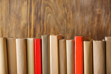 Many different books on wooden background