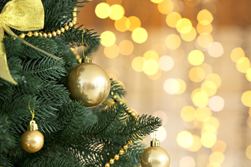 Obraz na płótnie Canvas Beautiful Christmas tree against defocused lights, closeup