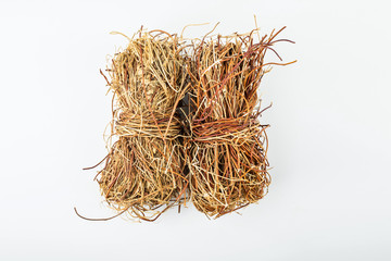 Dried chicken bone grass on white background