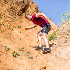 Runner during obstacles course training in the boot camp