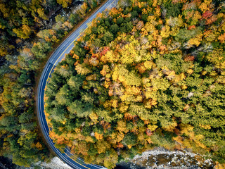 Scenic Mohawk Trail winding highway at autumn, Massachusetts, USA. Fall in New England. Aerial drone shot.