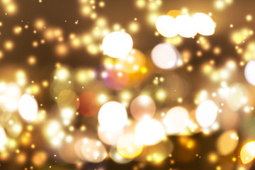 Abstract gold light bokeh background with snow