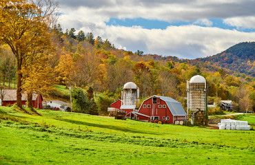 Farm with red barn and silos at sunny autumn day in West Arlington, Vermont, USA © haveseen