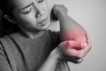 Women with pain in elbow.