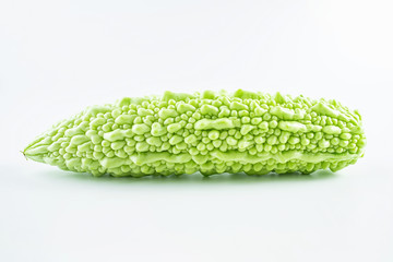 Fresh green vegetable bitter gourd on white background