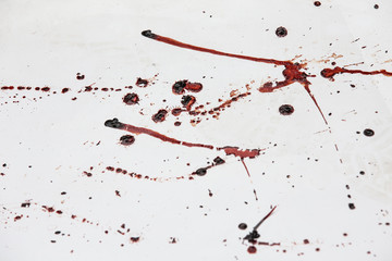 Splattered blood stain on white background