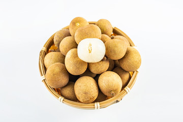 Fresh fruit longan on a plate on white background