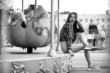 Girl in a clown makeup black and white