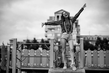 Girl in a clown makeup black and white
