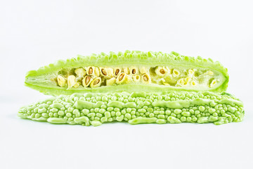 Fresh green vegetable bitter gourd on white background