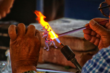 hands of man with candle