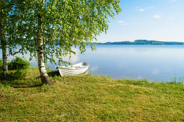 White boat on the lake.