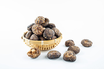 Dried fungus ingredients shiitake mushrooms on white background