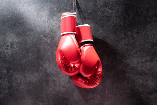 Pair Of Red Boxing Gloves Hanging