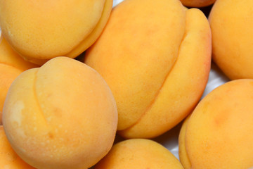 Naklejka na ściany i meble Close up. Peaches close up. Bright ripe peaches close up.