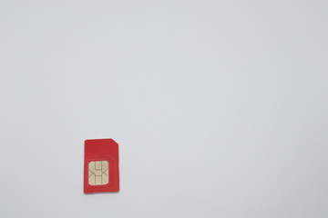 red sim card on the floor