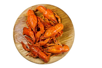 Boiled crayfish on wooden cutting board isolated on white background