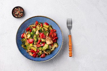  vegetable stire fried on blue plate