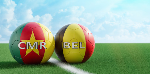 Belgium vs. Cameroon Soccer Match - Soccer balls in Belgium and Cameroon national colors on a soccer field. Copy space on the right side - 3D Rendering 