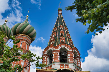 Fototapeta na wymiar Multicolored domes of St. Basil's Cathedral on Red square in Moscow, Russia