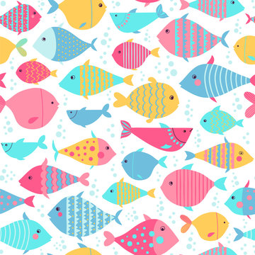 Seamless vector pattern with colorful fishes. Kids theme background.
