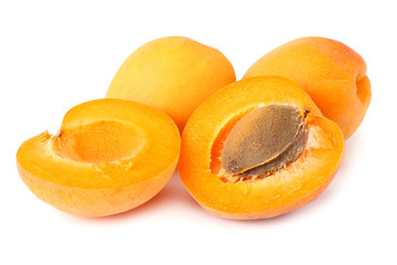 apricot fruits with slices isolated on white background.