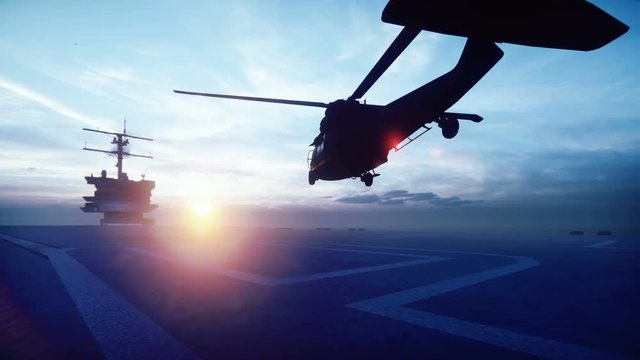Military helicopter Blackhawk takes off from an aircraft carrier in the morning in the endless blue ocean