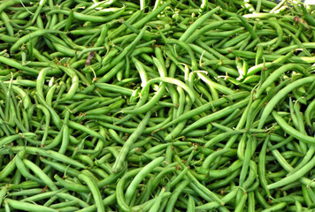 Green beans for sale at the Farmers Market on Cherry Street in Tulsa Oklahoma. Morning in summer on Route 66.