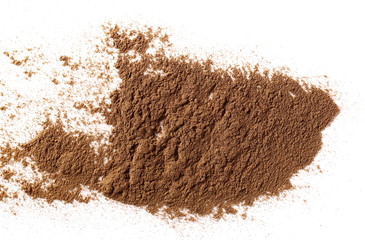 Cinnamon powder isolated on white background, top view