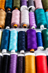 Thread. Bobbins of colorful threads. Sewing accessories
