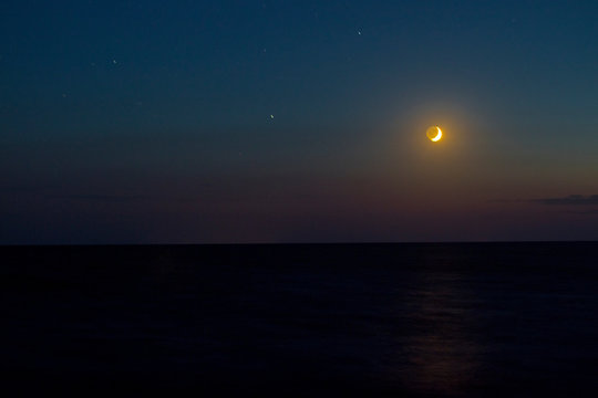 The sunset and the moon and the sea © Олег Васильев
