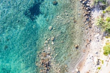 Aerial view of the rocky seashore. Beautiful coastline seen from above.