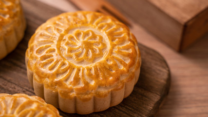 Round shaped moon cake Mooncake - Chinese style traditional pastry during Mid-Autumn Festival /...