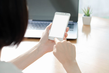 Business woman using laptop and smart phone stock photo
