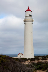 Fototapeta na wymiar Cape Nelson lighthouse near Portland in Western Victoria, Australia, is a popular tourist attraction.