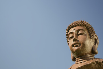Buddha head on sky background