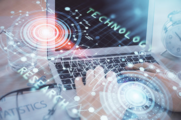 Businessman with computer background with technology theme hologram. Concept of big data. Double exposure.