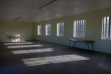 Prison room at former prison at Robben Island South-Africa