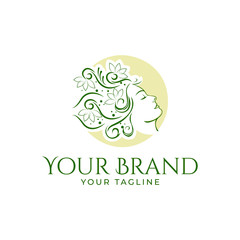 beautiful logo template of woman's face with leaf flower organic hair isolated in round shape