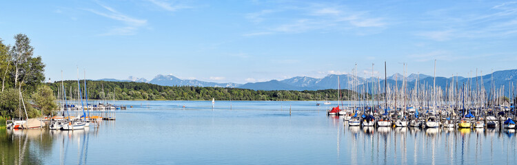 Fototapeta na wymiar Lake Chiemsee - Boats and mountain view