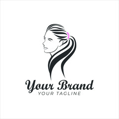 logo template of beautiful young woman's face with long hair
