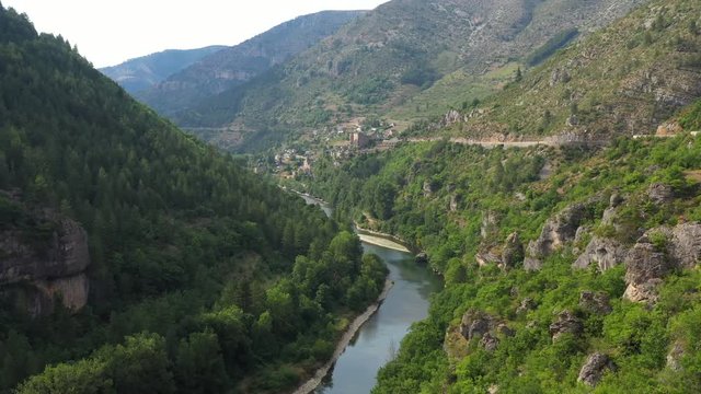 aerial flight over the Tarn river and Prades village France lozere Canyon forest landscape