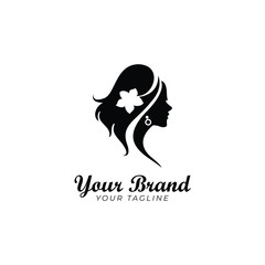 logo template of young silhouette woman with flower in her hair