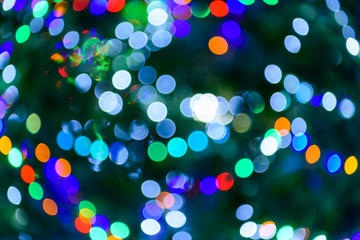 Defocused abstract colorful night lights bokeh background.