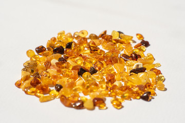 yellow amber stones on white background